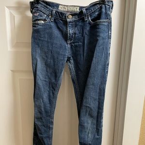 Size small/medium in women’s jeans. Worn but no stains.